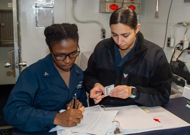 PHILIPPINE SEA (Nov. 7, 2023) Legalman 2nd Class Alexis Vanburen, left, from Dallas, and Legalman 3rd Class Audrey Carillo, from Downey, California, certify documents in the legal office aboard the U.S. Navy’s only forward-deployed aircraft carrier, USS Ronald Reagan (CVN 76), in the Philippine Sea,. Keyword research contracts: what to check before signing